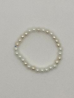 White Pearl Beaded Bracelet Regular size bracelet  Handmade with care in the UK Clay pearl beads  International shipping available ✨ *Returns and exchanges are not accepted. However if you have an issue with this product, then contact me and I'll try to resolve it. *Product may vary in colour due to photographic resources. Beaded Pearl White Bracelet With Round Beads, Pearl Beaded Rosary Bracelet With Round Beads, Pearl White Beaded Round Bracelet, White Beaded Bracelets With Jubilee Style, Classic White Beaded Bracelet, White Pearl Bracelet With 8mm Round Beads, Pearl White Bracelets With 8mm Pearl Beads, Beaded Pearl White Round Bracelet, Pearl White Beaded Round Pearl Bracelet