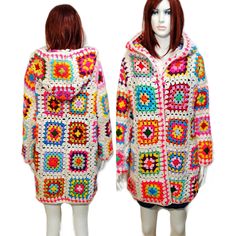 two mannequins dressed in colorful crochet clothing, one wearing a hoodie