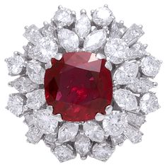 Magnificent Platinum Ring with Vivid Red Ruby &3.26 ct. Diamonds. Ruby looks lik 4.5 to 5 Ct ! Ruby: Natural Brilliant / Step Cut, Cushion shape, Vivid Red , Siam Ruby of 3 ct. Comes with GRS Certificate Diamonds: Brilliant cut 1.4 ct. Marquise cut diamonds 0.96 ct. Baguette cut diamonds 0.9 ct. Material: Platinum Ring size: 51 EU / 5.75 US ( Can be resized for free) Total weight: 12.7 gram / 0.450 oz / 8.2 dwt Luxury Ruby Ring With Diamond Cut, Luxury Brilliant Cut Diamond Ruby Ring, Luxury Exquisite Ruby Ring With Diamond Cut, Luxury Brilliant Cut Ruby Ring In Sterling Silver, Red Architecture, Exquisite Brilliant-cut Ruby And Diamond Ring, Red Bedding, Ruby Diamond Rings, Red Decor