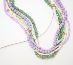 A creative combination of colors, shapes, and styles makes up this multi-strand beaded necklace. Wear it when you want an already well-assembled layered look or a bolder presence than single-strand pieces. From Susan Graver. Double Strand Colorful Beaded Necklaces For Layering, Multicolor Beaded Chain Necklace For Layering, Multicolor Beaded Chain Necklaces For Layering, Multicolor Beaded Necklaces For Layering, Multicolor Beaded Necklaces For Layered Looks, Multicolor Round Beads Necklaces For Layering, Multi-strand Beaded Necklaces, Multi-strand Necklaces For Layering, Multi-strand Beaded Necklace With Large Beads