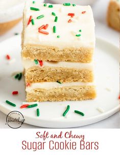 two slices of soft and chewy sugar cookie bars on a plate with sprinkles