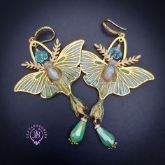 Luna Moth opal earrings with shimmers wings, made from high-quality colourful polymer clay, colours do not wash out and do not fade in the sun, decorated by Moonstone cabochons, Swarovski crystals and glass beads. Single copy,100% Handmade OOAK earrings. All items are shipped from my home within 1-3 business days after payment confirmation. Please, contact me with any questions. I make some custom orders. If you would like some items to be custom made or created for you in a special way, feel free to send an Etsy conversation with your requirements, and we can discuss them. Whimsical Green Czech Glass Earrings, Handmade Iridescent Fantasy Jewelry, Unique Green Butterfly Earrings, Handmade Iridescent Jewelry In Butterfly Shape, Iridescent Butterfly-shaped Handmade Jewelry, Handmade Iridescent Butterfly Jewelry, Green Butterfly Nature-inspired Jewelry, Nature-inspired Green Butterfly Jewelry, Handmade Green Fantasy Earrings