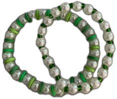 two bracelets with green and white beads