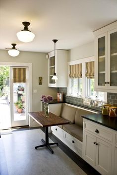 the kitchen is clean and ready to be used for cooking or dining, but it's not too far from the living room