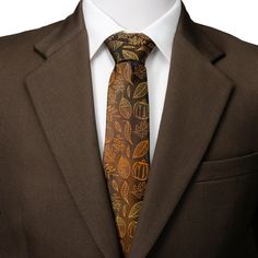 Perfect for bringing in the fall feeling, our Fall Spice Men's Brown Tie will warm up the boardroom. This chocolate brown tie features fall classics such as pumpkins and fallen leaves in a warm pumpkin spice color. Our tie will maintain its shape and hold a perfect knot thanks to the strong yet soft Silk Blend. Brown Suit And Tie Combinations, Elegant Suit And Tie Accessories For Fall, Classic Formal Ties For Fall, Formal Fall Suit And Tie Accessories Standard Tie, Classic Fall Formal Ties, Classic Fall Ties For Formal Occasions, Formal Fall Standard Tie Suit Accessories, Classic Ties For Formal Occasions In Fall, Formal Fall Standard Tie Accessories