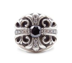 "Authentic Chrome Hearts Diamond Cross Ring  Heavy Sterling Silver Black and White Diamonds  Size 7.5  Hallmarks: \"Chrome Hearts\" \"© 1992 Sterling\" 1 round center black diamond and 14 round white diamonds prong set Band width at top: 20 mm (approx. 3/4\") Band width at bottom: 8 mm (approx. 5/16\") Silver finish: Blackened Good vintage condition with no major flaws to note Total weight: 21.1 grams 101017-4460  RL-144 FEEL FREE TO MESSAGE ME IF YOU HAVE ANY QUESTIONS OR WISH TO SEE MORE PICTU Designer Black Rings For Anniversary, Silver Pendant Lamp, Diamond Cross, Cross Ring, Yellow Gold Chain, Chrome Hearts, Quartz Ring, Diamond Sizes, White Diamonds