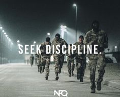 some soldiers are running down the street with words that say, seek discpline