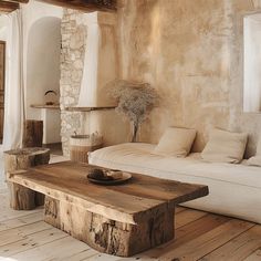 Inviting Mediterranean living room showcasing wooden coffee and side tables for a characterful and authentic look White Linen Couch, Rustic Mediterranean Farmhouse, Linen Couch