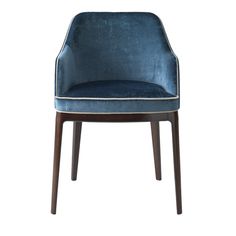 an upholstered blue chair with wooden legs