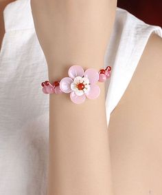 Beautiful Light Pink Coloured Glaze Shell Flower Cat's Eye Garnet Charm BraceletMade of fine Coloured Glaze Shell Flower Cat's Eye Garnet.Length: 25cm/9.75". Matches easily with daily hairstyle, dresses & Shirts Red Flower-shaped Jewelry For Spring, Red Flower Jewelry For Spring, Red Flower-shaped Spring Jewelry, Red Flower Decorated Jewelry For Spring, Spring Bracelets With Adjustable Flower Decoration, Adjustable Bracelet With Flower Decoration For Spring, Adjustable Flower Bracelets For Spring, Adjustable Spring Bracelet With Flower Decoration, Red Bracelet Gift For Spring