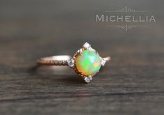 14/18K Aurora Opal Ring Gold Ethiopian Fire by MichelliaDesigns Celestial 14k Gold Opal Wedding Ring, Magical Rose Gold Jewelry For Anniversary, Celestial Style Opal Ring With Halo For Anniversary, Celestial Opal Ring With Halo For Anniversary, Celestial Halo Opal Ring For Anniversary, Mystical Yellow Gold Wedding Ring, Mystical Halo Jewelry For Weddings, Celestial Halo Design Wedding Jewelry, Celestial Halo Jewelry For Wedding