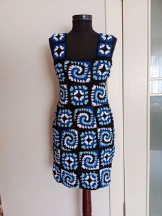 Fitted Crochet Sundress For Beach Season, Crochet Mini Sundress, Blue Crochet Sleeveless Dress, Blue Fitted Crochet Lace Dress, Summer Beach Crochet Dress With Granny Square, Fitted Blue Crochet Dress, Fitted Blue Crochet Lace Dress, Summer Beach Crochet Dress With Granny Square Details, Handmade Sleeveless Crochet Summer Dress