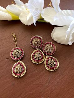 Whether you are the bride or sassy bridesmaid, no lehenga is complete without a maang tikka set. The maang tikka set is perfect to steal the show with its glitter and texture. The meticulous attention paid to the craftsmanship makes it an epitome of jewelry inspiration. 100% Satisfaction Guarantee: Long Lasting Plating, High-Quality Stones. Gifting: This pair of charming earrings and maang tikka set come in a beautiful gift box, making it an ideal gift for birthday, wedding anniversary or weddin Festive Tikka With Matching Earrings As Gift, Festive Wedding Tikka With Matching Earrings, Wedding Diwali Tikka With Matching Earrings, Earrings And Tikka Set, Maang Tikka Earring Set, Maang Tikka Set, Polki Earrings, Wedding Bridesmaid Jewelry, Indian Wedding Jewelry