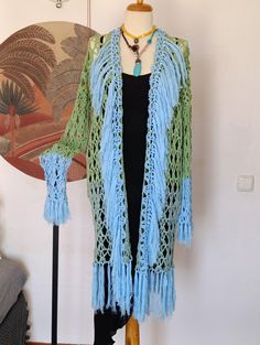 Light Blue Baby Blue Fringed Handknit Long Lace Cardigan, Minimalist Design Vibrant Crochet Jacket, Boho Chic Hippy Tunic by Papicca on Etsy Green Knit Cardigan For Spring, Multicolor Knit Cardigan For The Beach, Green Knitted Cardigan For Spring, Multicolor Knit Beach Cardigan, Blue Cotton Knit Cardigan, Blue Open Knit Cardigan For Summer, Bohemian Knitted Cotton Cardigan, Bohemian Crochet Cotton Cardigan, Bohemian Cotton Knitted Cardigan