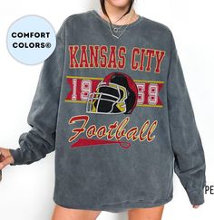 The perfect, comfortable sweatshirt to cheer on your favorite Kansas City Football team! Luxurious comfort and style are what this unisex, garment-dyed sweatshirt is all about. It's made with 80% ring-spun cotton and 20% polyester and the fabric is 3-end garment-dyed, ring-spun, color-blast fleece with a 100% cotton face. Each sweatshirt comes with a relaxed fit, a rolled-forward shoulder, and a back neck patch.  .: 80% ring-spun cotton, 20% polyester .: Medium-heavy fabric (9.5 oz /yd² (322.1 g Retro Long Sleeve Sweatshirt For Fans, Retro Fan Gear Sweatshirt For Fall, Oversized Sweatshirt With Letter Print For School Spirit, Oversized Letter Print Sweatshirt For School Spirit, Vintage Long Sleeve Fan Gear Tops, Oversized Graphic Print Sweatshirt For School Spirit, Oversized Sweatshirt For School Spirit Streetwear, Oversized Letter Print Sweatshirt For School, Oversized School Spirit Sweatshirt With Graphic Print