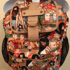 Nwot- Tokidoki Lesportsac Scuola Tan Playground Backpack "Rare, Retired"..This Bag Has The Best Print Placement. You’re Getting This Bag “Like New!!!” A Steal At This Price. Tags Removed: Used Once. This Is A Great Drawstring Top Closure; Flap D-Ring Closure. Front Pocket With Multi-Color Zippered Closure Has Inside Carabiner On Stretch Cord For Easy To Find Keys. Two Side Mesh Pockets For Easy Access Items. Inside Back Has Zipper Pocket. Adjustable Shoulder Straps. Clean. 11.5 X 11.25 X 5.25 Cute Multicolor Travel Satchel, Playful Brown School Bag, Harajuku Style Red Bags For Everyday Use, Red Harajuku Style Bags For Everyday Use, Harajuku Style Multicolor Travel Bag, Red Harajuku Bags For Everyday Use, Tokidoki Backpack, Tokidoki Cactus Friends, Harajuku Multicolor Travel Bag