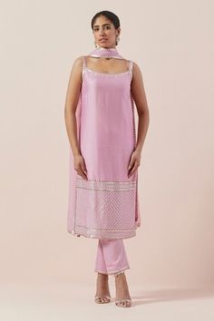 Orchid pink kurta with aari, zari and sequin in chanderi base. Paired with a cotton pant and silk organza dupatta with silver and gold hand embroidery. - Aza Fashions Pink Silk Sets With Mirror Work, Pink Sleeveless Salwar Kameez With Resham Embroidery, Festive Pink Sleeveless Salwar Kameez, Pink Sleeveless Salwar Kameez For Festive Occasions, Pink Sleeveless Traditional Wear With Resham Embroidery, Pink Sleeveless Sets With Zari Work, Sleeveless Fitted Salwar Kameez With Mirror Work, Fitted Sleeveless Salwar Kameez With Mirror Work, Pink Sleeveless Anarkali Salwar Kameez