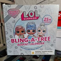 an advertisement for the lol surprise blindfolded dolls on display in a store