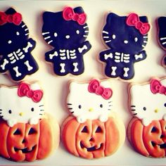 hello kitty cookies decorated with icing and pumpkins