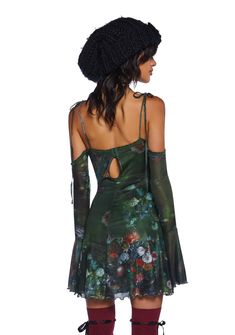 This mini dress has a stretchy knit construction with a mesh overlay, an all-over floral art print, lace detailing, a front self-tie closure, off-the-shoulder sleeves with bell cuffs, self-tie shoulder straps, a lettuce trimmed hem, and a back hook closure. Spring Off-shoulder Mini Dress With Sheer Sleeves, Spring Sheer Sleeved Off-shoulder Mini Dress, Spring Fitted Mini Dress With Bell Sleeves, Fitted Floral Print Dress With Bell Sleeves, Fitted Floral Print Bell Sleeve Dresses, Bohemian Off-shoulder Mini Dress For Party, Bohemian Fitted Dress With Sheer Sleeves, Fitted Bohemian Dress With Sheer Sleeves, Summer Party Mini Dress With Bell Sleeves