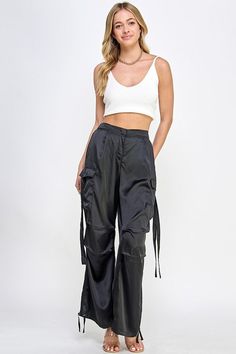 STYLED BY ALX COUTURE MIAMI BOUTIQUE Black Satin Utility Cargo Pants Utility Cargo Pants, Everyday Style, Black Satin, Daily Fashion, Satin Fabric, Cargo Pants, Everyday Fashion, Vintage Shops, Relaxed Fit