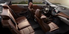 the interior of a car with brown leather seats