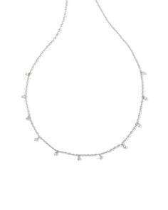 We’re obsessed with the dainty detailing on the Henry Strand Necklace in Silver. From its diamond-shaped metal charms to its delicate chain, this necklace will bring eye-catching texture to every layered look. Metal Rhodium Over Brass Closure Lobster Clasp Size 16" Chain With 3" ExtenderDue to the one-of-a-kind nature of the medium, exact colors and patterns may vary slightly from the image shown. | Kendra Scott Henry Strand Necklace in Silver | Metal Kendra Scott Store, Sold Out Sign, Kendra Scott, Metal Charm, Layered Look, Strand Necklace, Diamond Shapes, Metallic Silver, Silver Necklace