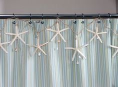 a curtain with starfishs hanging from it