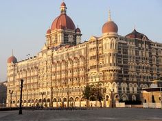 a large building with many windows and domes