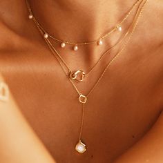 Put a twist on your typical cuff necklace with this unique piece that is sure to turn heads! This standout necklace features a Mobius strip-esque pendant in 14k gold plating paired with a smaller, traditional cuff decorated with cubic zirconia stones. Cuff Necklace, Mobius Strip, Dainty Pearl Necklace, Pearl Lariat Necklace, Pearl Lariat, Cleaning Silver Jewelry, Shell Pendant, Silver Pieces, Jewelry Inspo