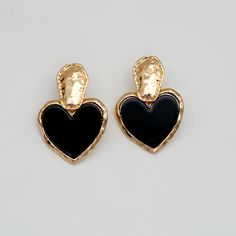 Discover Timeless Elegance Introducing our latest collection piece, the Black Heart Drop Earrings, a perfect blend of vintage charm and contemporary fashion. These earrings feature a classic heart shape, embodying love and elegance in every detail. Crafted from durable zinc alloy, they boast a glossy black finish that adds a touch of sophistication to any outfit. Ideal for women who adore fashion-forward accessories, these earrings are sure to make a statement at any event. Product Features Our Black Heart Drop Earrings are more than just a fashion statement. They are designed with the modern woman in mind, offering both style and comfort. The zinc alloy material ensures durability and long-lasting wear, while the heart-shaped design exudes romance and elegance. With their easy-to-wear dro Cheap Black Heart-shaped Earrings, Elegant Black Earrings With Heart Charm, Trendy Black Heart-shaped Earrings, Black Drop Earrings For Valentine's Day, Chic Metal Heart Earrings For Pierced Ears, Black Heart-shaped Earrings For Gift, Elegant Black Metal Heart Earrings, Trendy Black Metal Heart Earrings, Trendy Black Heart Earrings For Gift