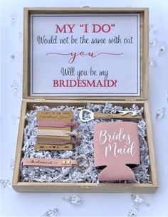 the bridesmaid gift box is filled with personalized items