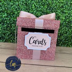 a pink card box with a bow on top and words that say cards thank you