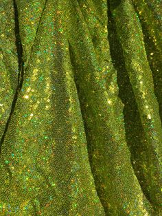 Beautiful sequins fabric. 3 mm sequins. Little stretchy. Width is 56-60”. Sold by yard. Green Glamorous Sequin Fabric For Festive Occasions, Green Glamorous Sequin Fabric For Party Season, Glamorous Green Sequin Fabric For Festive Occasions, Glamorous Green Sequin Fabric For Party Season, Embellished Green Sequin Fabric For Party Season, Shiny Sequin Fabric For Party Season, Green Sequin Fabric For Party, Green Sequin Fabric For Festive Party, Green Sequin Fabric For Party And Festive Occasions