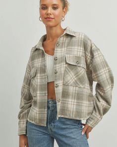 A fall wardrobe classic. Crafted from soft, brushed fabric, this cropped flannel shirt is a timeless go-to for all your autumn plans. Made for layering with it's relaxed fit and cozy midweight fabric. Toss it over a tee for those just-chilly enough afternoons, or wear it under your favorite jacket when the temps drop. Model is 5'8" wearing a size small Cropped Flannel, Flannel Shacket, Cropped Button Down, Wardrobe Classic, Grey Plaid, Gray Plaid, Plaid Jacket, Flannel Fabric, Navy Color