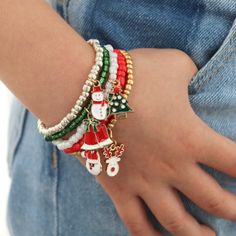 "5 Christmas charm bracelet a nice gift for your loved ones or even for yourself. Details: ❤ Materials of the bracelets: ✮ Beads: 4mm red, green, white, gold, silver beaders. ✮ Charm: Santa, snowman, bells, deer, tree enamel charms ✮ Made on strong stretchy elastic. ❤ Size: 4 - 5 years - 6\" 6 - 7 years - 6,5\" 8 - 12 years - 7\" S - 7,25\" M - 7,5\" L - 7,75\" XL - 8\" ❤ Bracelet comes in a little gift box ❤ You can personalize this bracelet with a name on it or with a paper card. ❤ We have oth Pumpkin Jewelry, Advent For Kids, Christmas Party Gift, Stocking Stuffers For Kids, Halloween Bracelet, Kids Christmas Party, Christmas Party Favors, Word Bracelet, Treat Gift