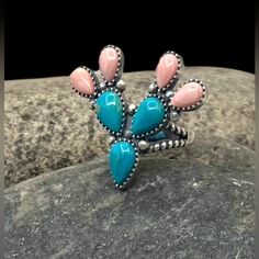 Signed Navajo Sterling Silver Turquoise Pink Conch Shell Multi Stone Cactus Ring 7.25 Orders Totaling $100 And Up Include An Anti-Tarnish Treated Velvet Jewelry Pouch! Ring Is A Size 7.25 Face Of Ring Measures Approximately 1.25" X 1.5" Weighs Approximately 10 Grams Condition: New!!! Metal: Sterling Silver See Photos For Hallmark Comes In A Gift Box Bohemian Teardrop Turquoise Ring, Handmade Pink Southwestern Jewelry, Western Engagement Rings Turquoise, Cowgirl Turquoise, Vintage Navajo Jewelry, Stone Cactus, Cactus Ring, Vintage Turquoise Jewelry, Rodeo Jewelry