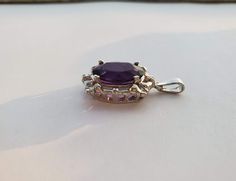 ♥ Product Summary ♥Main Stone: Amethyst Total Carat Weight: 7.77cttwMetal Choice: 14K Solid White GoldStone Cut: OvalDimensions: 23mm x 18mm (.91 inch by .71 inch) Size of Stone: 16mm**Pendant only Oval Purple Diamond Cut Jewelry, Purple Oval Diamond Cut Jewelry, Formal Purple Necklace With Polished Finish, Classic Amethyst Oval Pendant Jewelry, Ruby Diamond Rings, Symbolic Jewelry, Gift For Her Birthday, Necklace Wedding, Birthstone Gifts