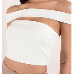 White Hot!! This Off-Shoulder Crop Top Can Be Dressed Up For A Night Out Or Down With Denim Shorts And Sandals On A Casual Saturday. Never Worn. White One-shoulder Tube Top, White Off-shoulder Top For Party, Elegant White Bandage Top, White One-shoulder Fitted Tube Top, Trendy White Off-shoulder Crop Top, White Fitted One-shoulder Tube Top, White Off-shoulder Crop Top For Parties, White Off-shoulder Crop Top For Night Out, Chic White Off-shoulder Tube Top