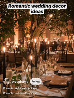 an image of a table set for a wedding with candles and flowers in vases