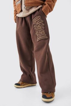 For a trendy outfit that offers comfort and practicality, choose joggers. Who said you can't make a style statement with a casual getup? Inject some chic into your off-duty wardrobe with a pair of men's joggers from our brand new collection. Whether you're after the ultimate casual combo or you're just on the hunt for a pair of comfy joggers for your down time, our edit has you covered. Need some style inspo? Try teaming your jogging bottoms with a hoodie, a denim jacket and high top trainers. For something a bit more on the smart side, combine a coat with black joggers and smart trainers.Style: Printed JoggersDesign: Plain BrandedFabric: BrushbackLength: Regular Brown Joggers, Gym Jacket, Going Out Shirts, Plus Size Suits, Comfy Sweatpants, Sweatpants Outfit, Joggers Outfit, Fitted Joggers, Jogging Bottoms