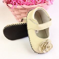 These Adorable Mary Jane Style Baby Shoes Are Perfect For Any Special Occasion Or Everyday Wear. With A Snap Closure, They Are Easy To Put On And Take Off, And The Faux Leather Outsole Makes Them Comfortable For Little Feet. They Come In A Beautiful Beige Color With A Patent Leather Upper Material That Will Make Any Little Princess Feel Like Royalty. The Shoes Feature A Variety Of Themes Including Easter, Flowers, Roses, Butterflies, Holidays, Baby Showers, Birthdays, Special Occasions, St. Patr Cute Cream Non-slip Booties, Cute Non-slip Leather Booties, Cream Booties With Round Toe For Playtime, Cream Round Toe Booties For Playtime, Non-slip Leather Booties, Cute Leather Booties With Non-slip Details, Spring Brown Booties With Soft Sole, Cute Leather Non-slip Booties, Cute Leather Spring Booties