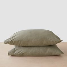 two pillows stacked on top of each other