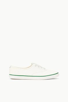 STAUD + KEDS CHAMPION CANVAS WHITE GREEN Champion Sneakers, Keds Champion, Spring Flats, Custom Handbags, Flat Heel Boots, Canvas Shoe, Sandal Platform, Crossbody Clutch, Wedge Sneakers