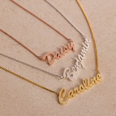 Everyone deserves a thoughtful gift like this Custom Name Necklace. Whether it's to celebrate Mother's Day, a baby shower or birthday, it is a must-have for your loved ones and makes the perfect minimalist gift for someone who has everything. Material: High Quality Solid 925 Sterling Silver Finish: Sterling Silver ∙ 18K Gold ∙ Rose Gold Dimensions: Depending on your font choice, height sizes range from 3mm to 5mm lowercase SKU: MM-NM81F105 Minimalist Name Necklace For Birthday Gift, Dainty Custom Name Charm Necklaces For Birthdays, Minimalist Sterling Silver Name Necklace For Birthday, White Name Necklace For Mother's Day Or Birthday, Dainty Name Necklace As A Gift, White Name Necklace For Birthday And Mother's Day, Minimalist Personalized Charm Necklace As Gift, Minimalist Necklace For Father's Day Gift, Minimalist Custom Name Charm Necklace As Gift