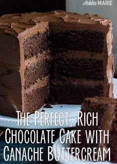 the perfect rich chocolate cake with ganache buttercream is cut into slices and served on a plate