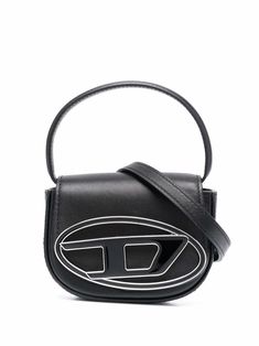 Black calf leather 1DR XS leather mini bag from DIESEL featuring logo plaque, single top handle, adjustable detachable shoulder strap, foldover top with magnetic fastening, main compartment and internal logo patch. Diesel 1dr, Diesel Bag, Vogue France, Structured Bag, Black Leather Crossbody Bag, Van Cleef Arpels, Black Cross Body Bag, Lady Dior, Nappa Leather