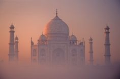 the tajwa mosque is surrounded by fog