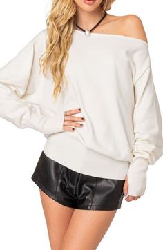 Feel the warmth of this slouchy off-the-shoulder sweater designed with thumbhole cuffs and ribbed trim. Off-the-shoulder neck Long sleeves with thumbhole cuffs 100% acrylic Hand wash, dry flat Imported White Off-shoulder Fall Sweater, Trendy Long Sleeve Off-shoulder Top For Fall, Spring Off-shoulder Sweater, Trendy Fall Off-shoulder Long Sleeve Top, Casual Ribbed Off-shoulder Top For Fall, Solid Color Off-shoulder Fall Sweater, Solid Off-shoulder Sweater For Fall, Solid Fall Off-shoulder Sweater, Solid Off-shoulder Sweater For Spring