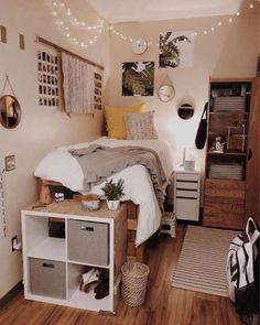 a bed room with a neatly made bed and lots of lights on the wall above it